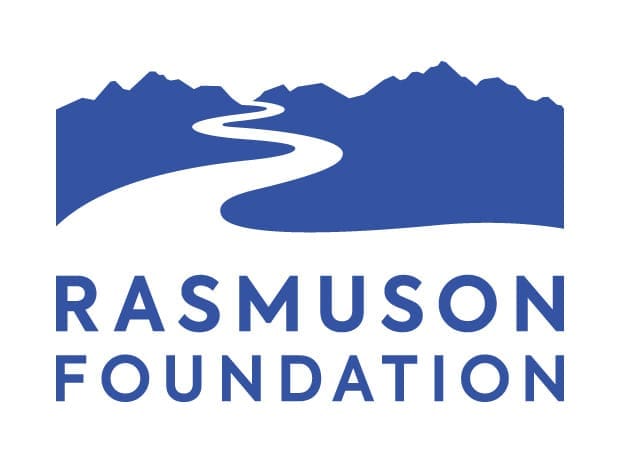 Rasmuson Foundation logo - The name of the foundation underneath a white winding road or river disappearing into a mountain range.